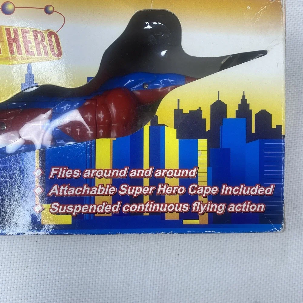 Flying Super Hero Action Figure Toy Battery Operated Cape Included Spins In Air